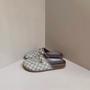 Gucci Gray Mules with Sleek Design